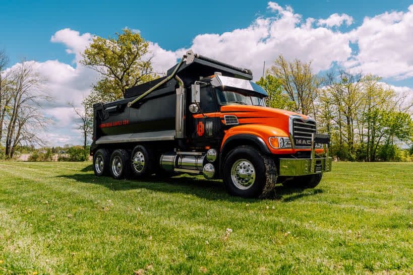 Win a Mack CV713 Dump Truck + Cat Skid Steer, Mini Excavator, Trailer & $20K Cash (OB44)
